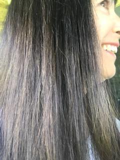 Photograph of Cindy Borsi' dark brown, straight Hair AlpacaSoaps Alpaca Soaps