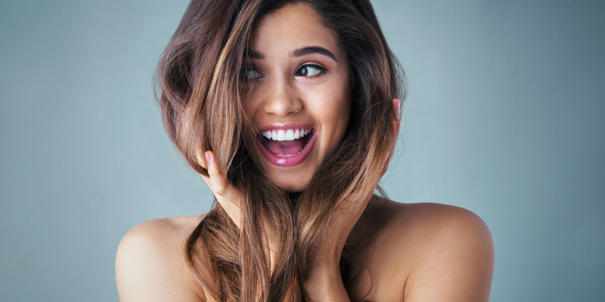 Image of woman with bad hair for blog post: The Mane Attraction: Keeping Your Hair Healthy and Happy