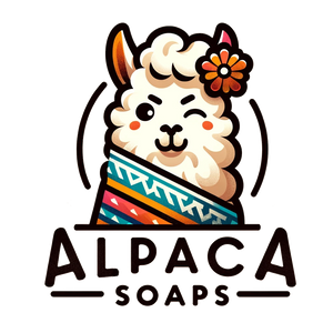 Logo of Alpaca Soaps, featuring an adorable, smiling alpaca with a flower behind its ear, peeking over a colorful, geometric-patterned blanket. The company name 'Alpaca Soaps' is written below in stylized, friendly lettering