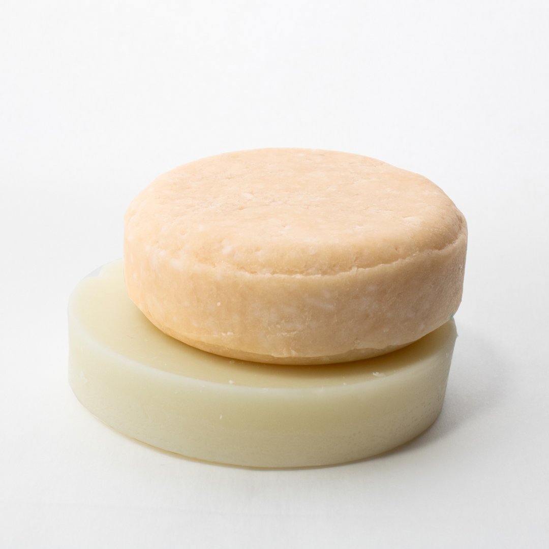 a close up of a doughnut on a white surface