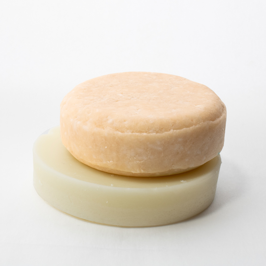 a close up of a doughnut on a white surface