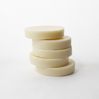 a stack of sliced cheese on a white background