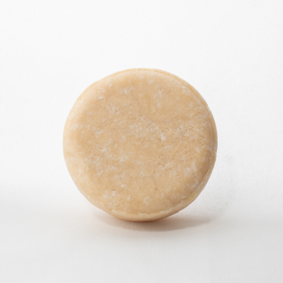 a round cookie sitting on top of a white table