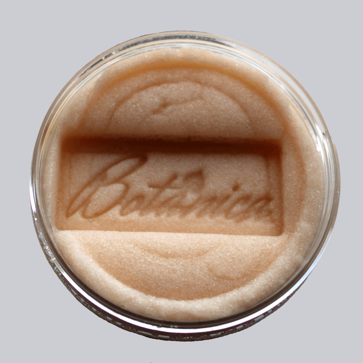Open jar of sugar body scrub showing the texture, stamped Botanica AlpacaSoaps Alpaca Soaps, Tan, Honey Oatmeal