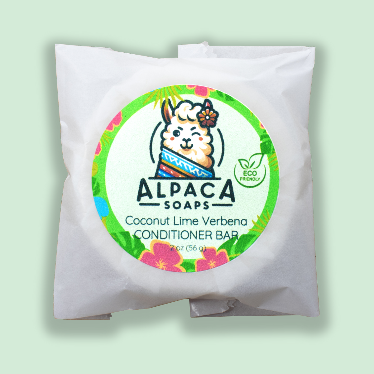 a bag of alpaca soap on a green background